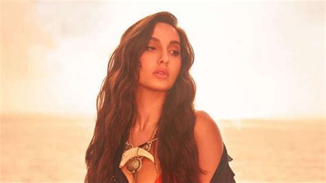 nura bikini|Nora Fatehi flaunts her sexy curves in red hot bikini, shares jaw .